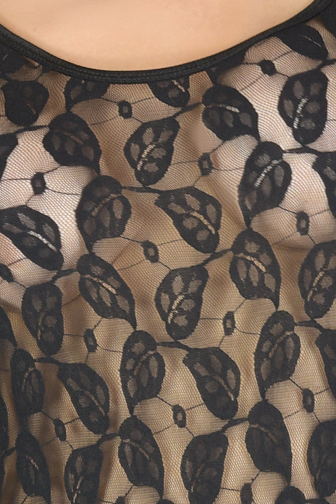 Close-up of a black lace pattern on sheer fabric bodysuit for the crossdresser & transgender woman
