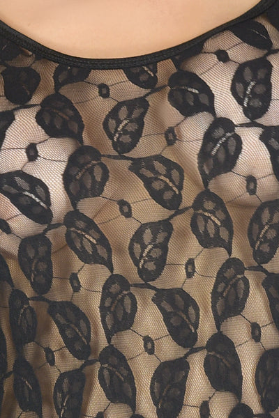 Close-up of a black lace pattern on sheer fabric bodysuit for the crossdresser & transgender woman