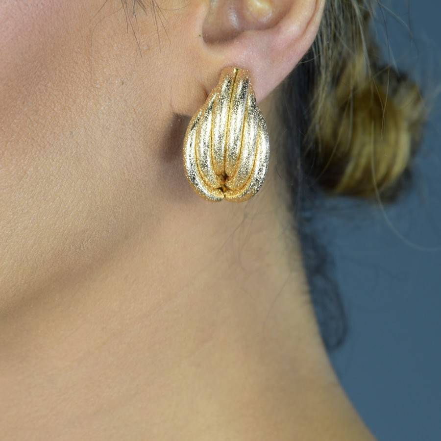 Goldtone button clip earrings